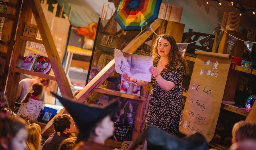 A teacher reading to children